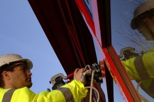 Glazing professional working on windows