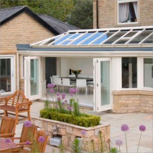 house with conservatory and open bifold doors