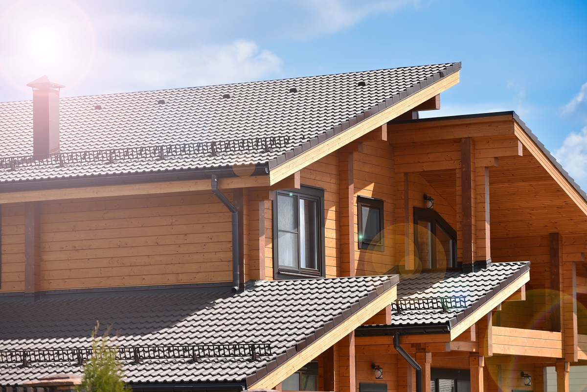 wooden two storey house on sunny day